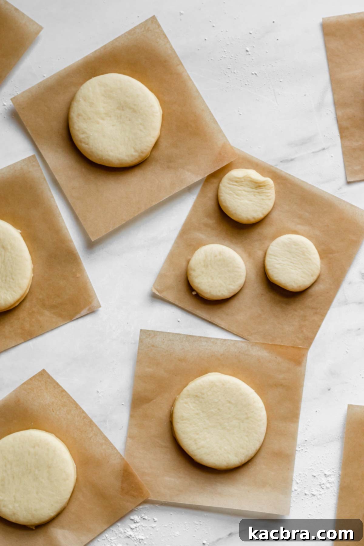 Zesty Meringue Cloud Donuts 9 Cut out donuts on sheets of parchment paper ready to rise again, then fry.