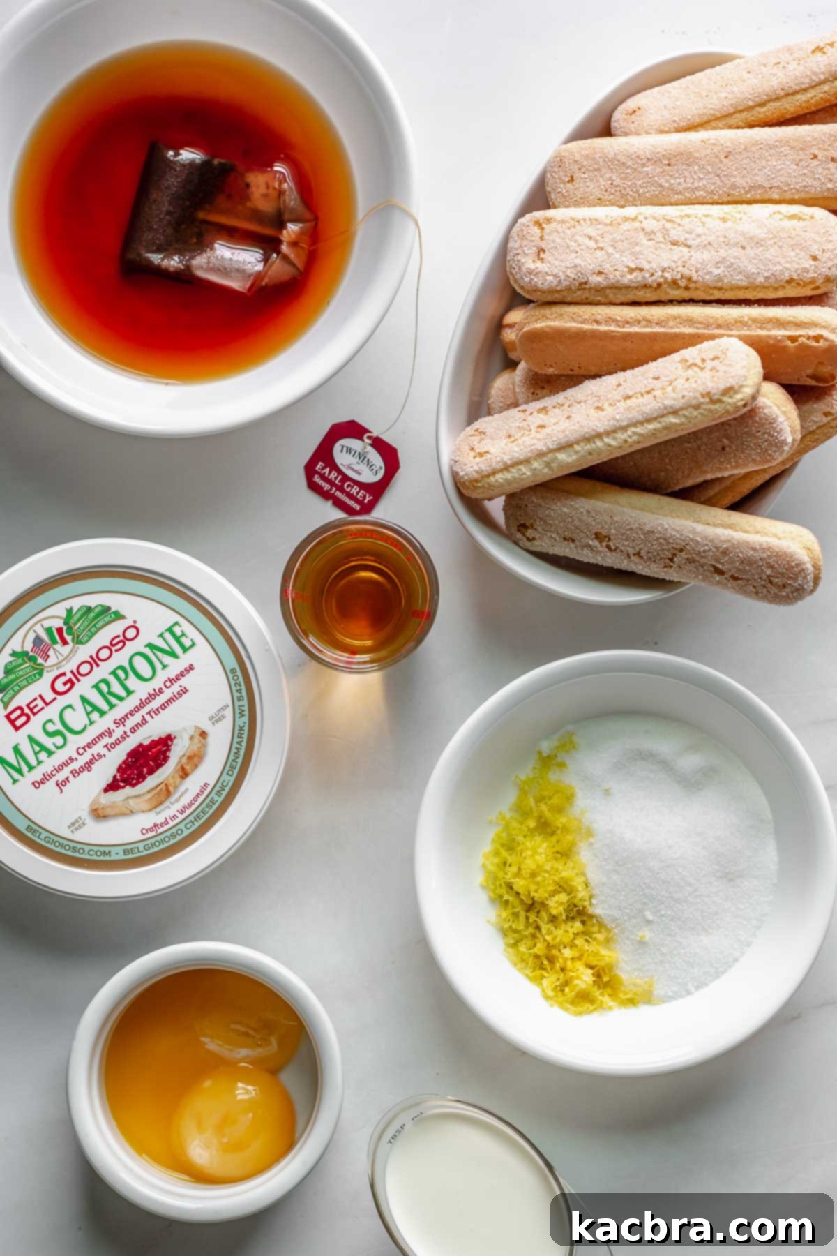 Ingredients for Earl Grey Tiramisu neatly arranged on a counter.