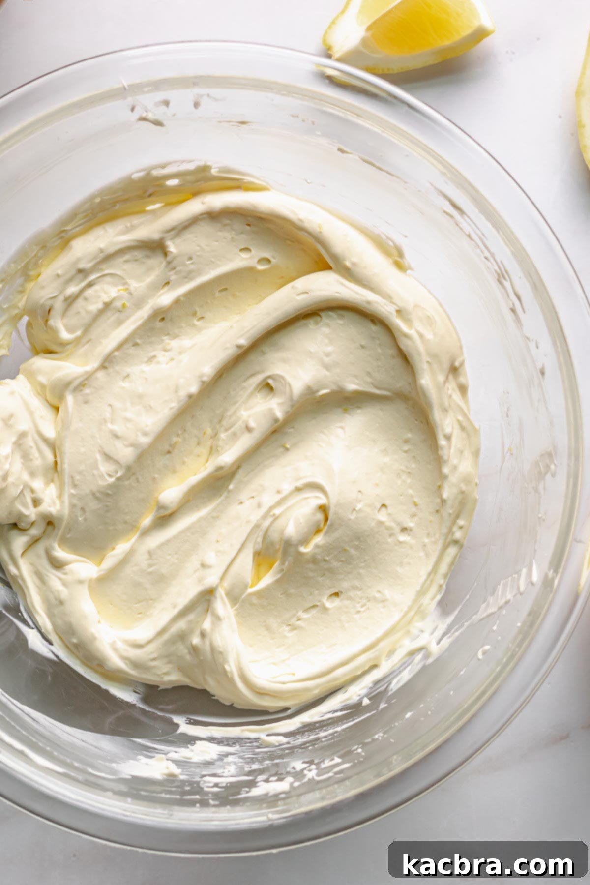 Finished lemon mascarpone cream with appealing swoops and a smooth texture.