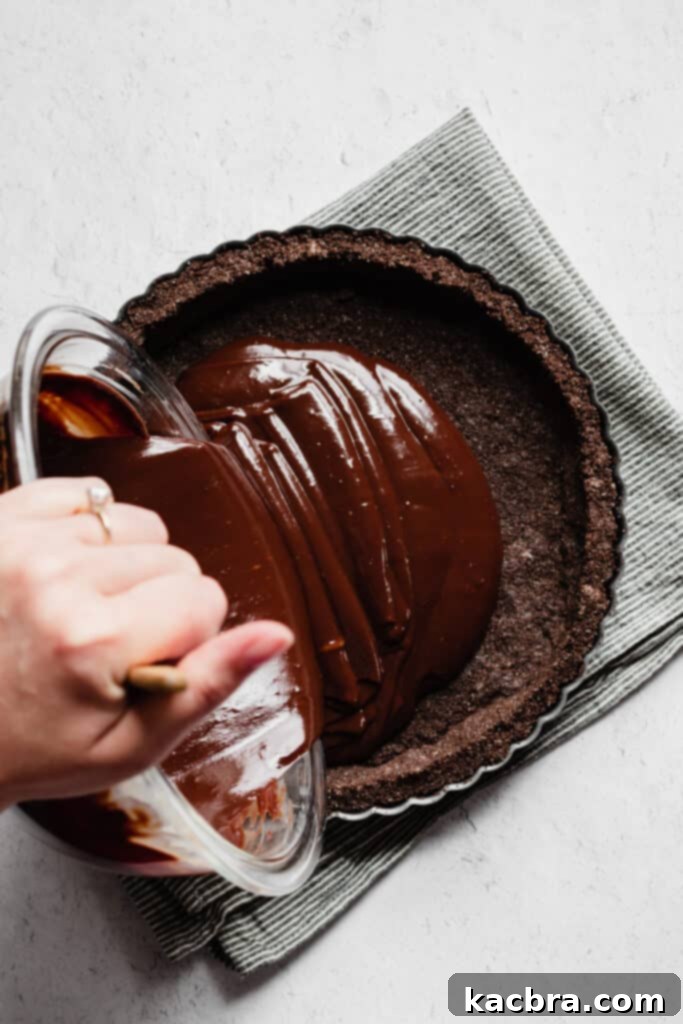 The finished chocolate espresso ganache poured into the baked graham cracker crust.