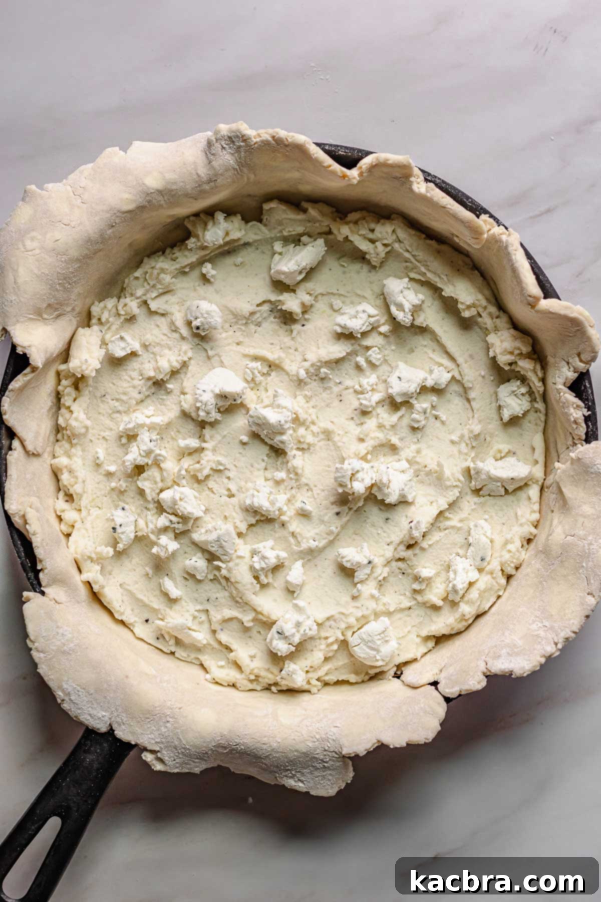 Sweet Caramelized Onion & Mushroom Potato Tart 7 Goat cheese on top of the mashed potatoes.