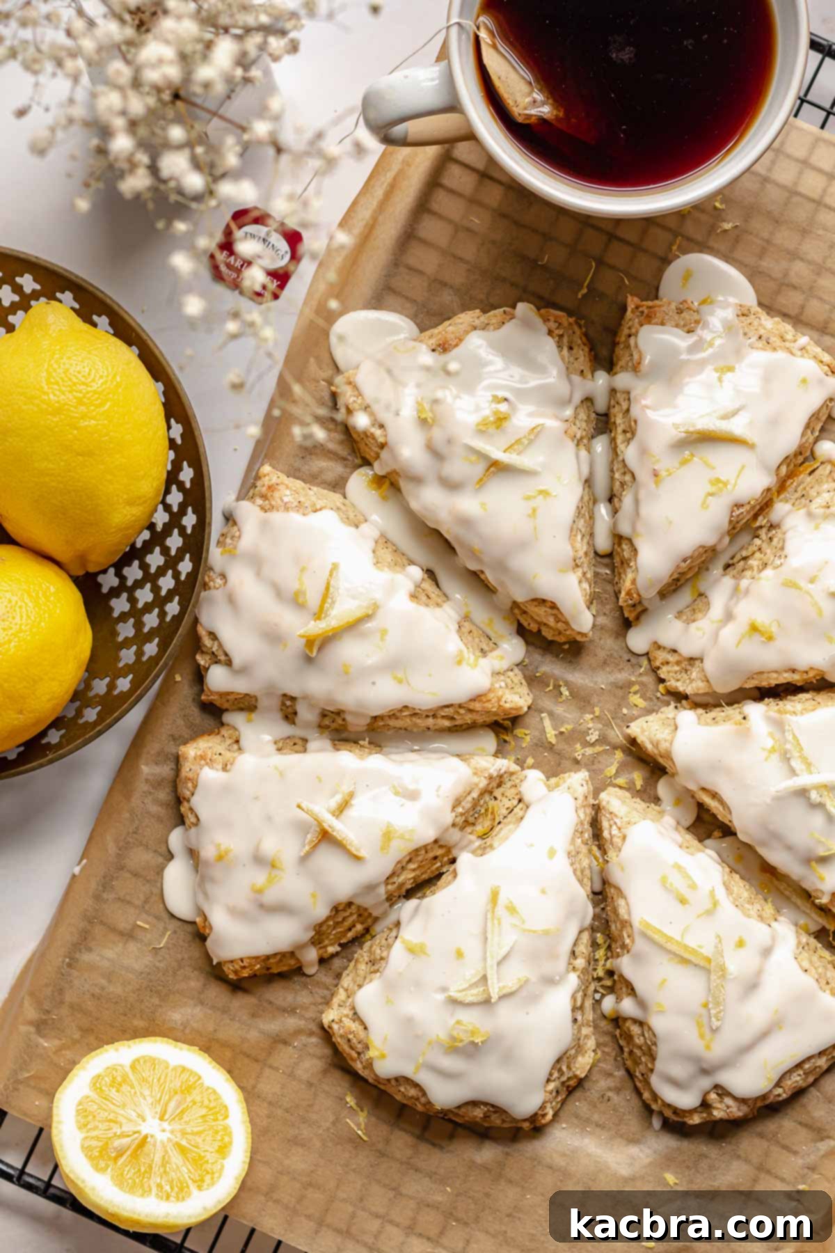 Bergamot Scones with Tangy Lemon Glaze 3 Earl grey scones after being iced, showing the smooth lemon glaze.