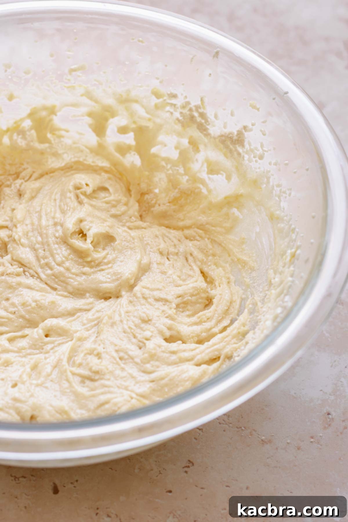 Creamed cake ingredients in a bowl.