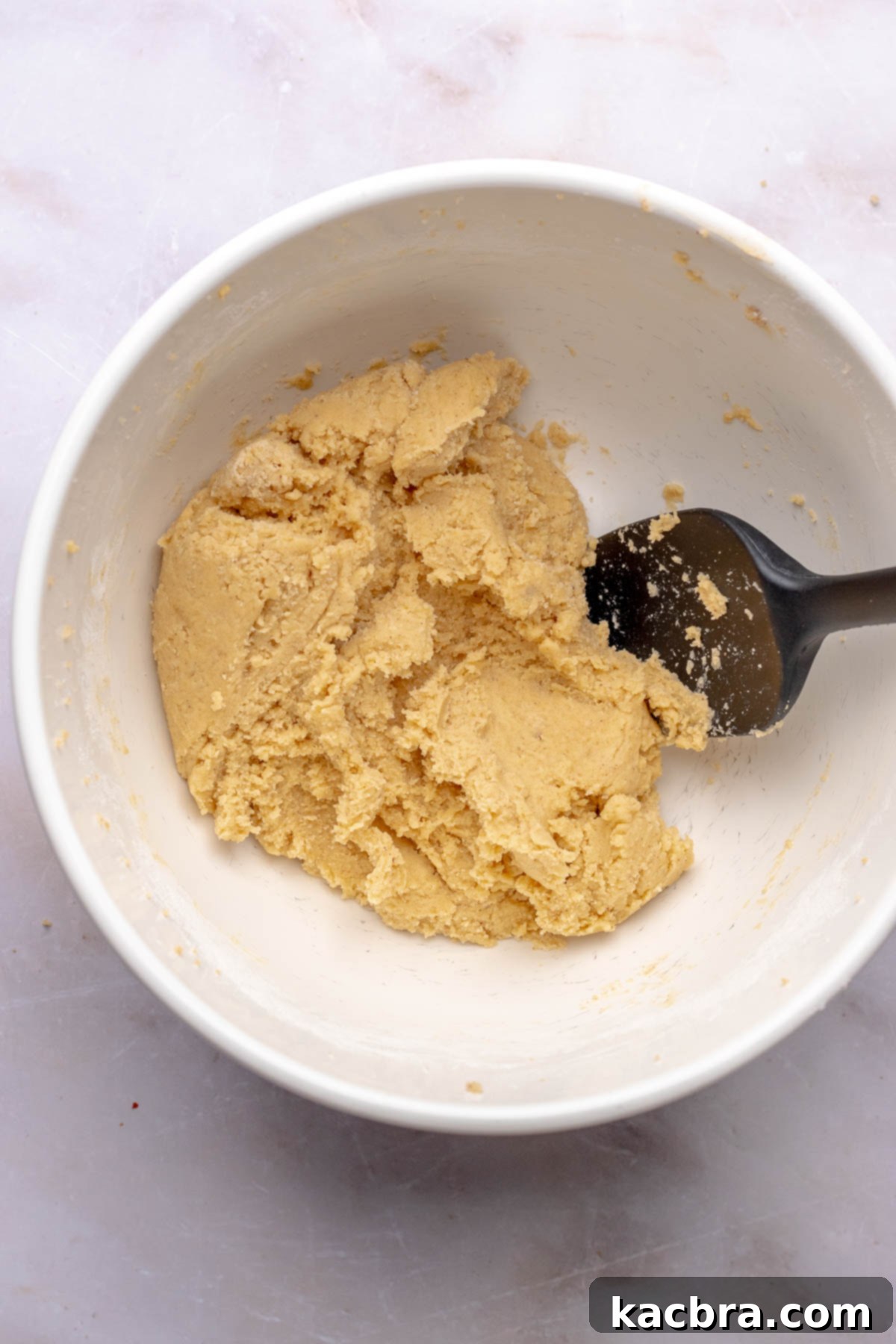 Snickerdoodle cookie dough in a bowl.