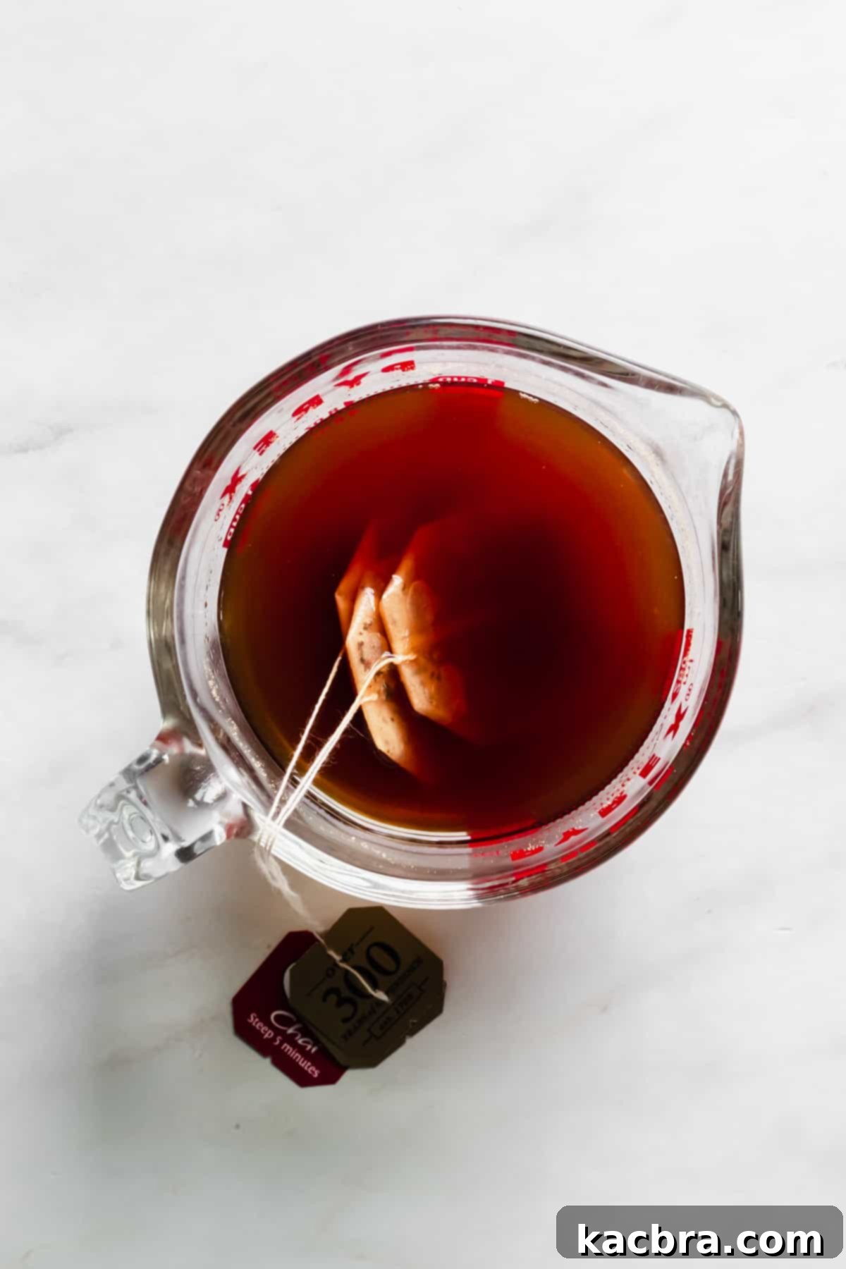 Harvest Pumpkin Chai Tiramisu 3 Overhead shot of tea bags steeping in a bowl.