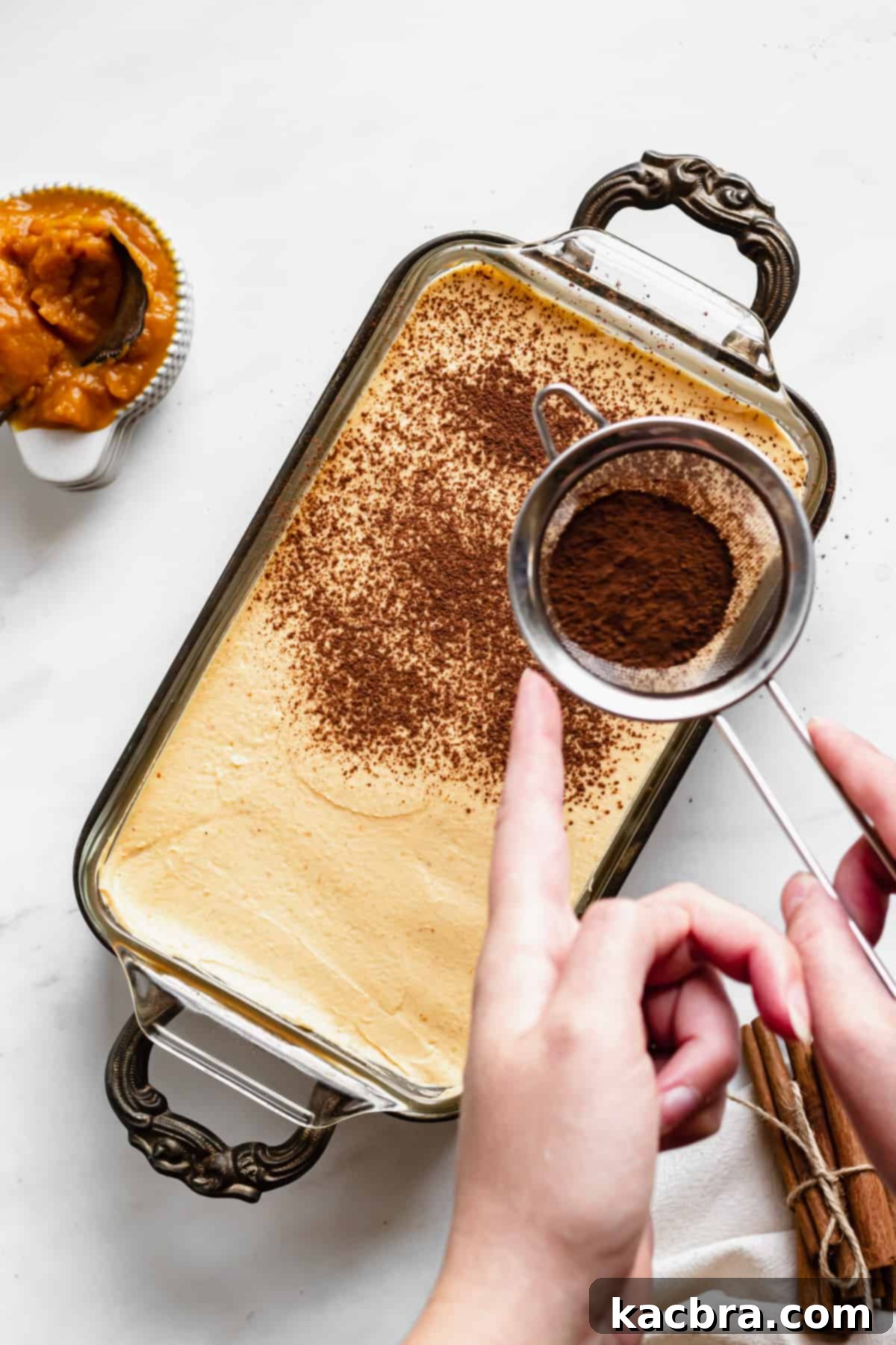 Harvest Pumpkin Chai Tiramisu 9 Cocoa powder and cinnamon dusted on top of the pumpkin chai tiramisu