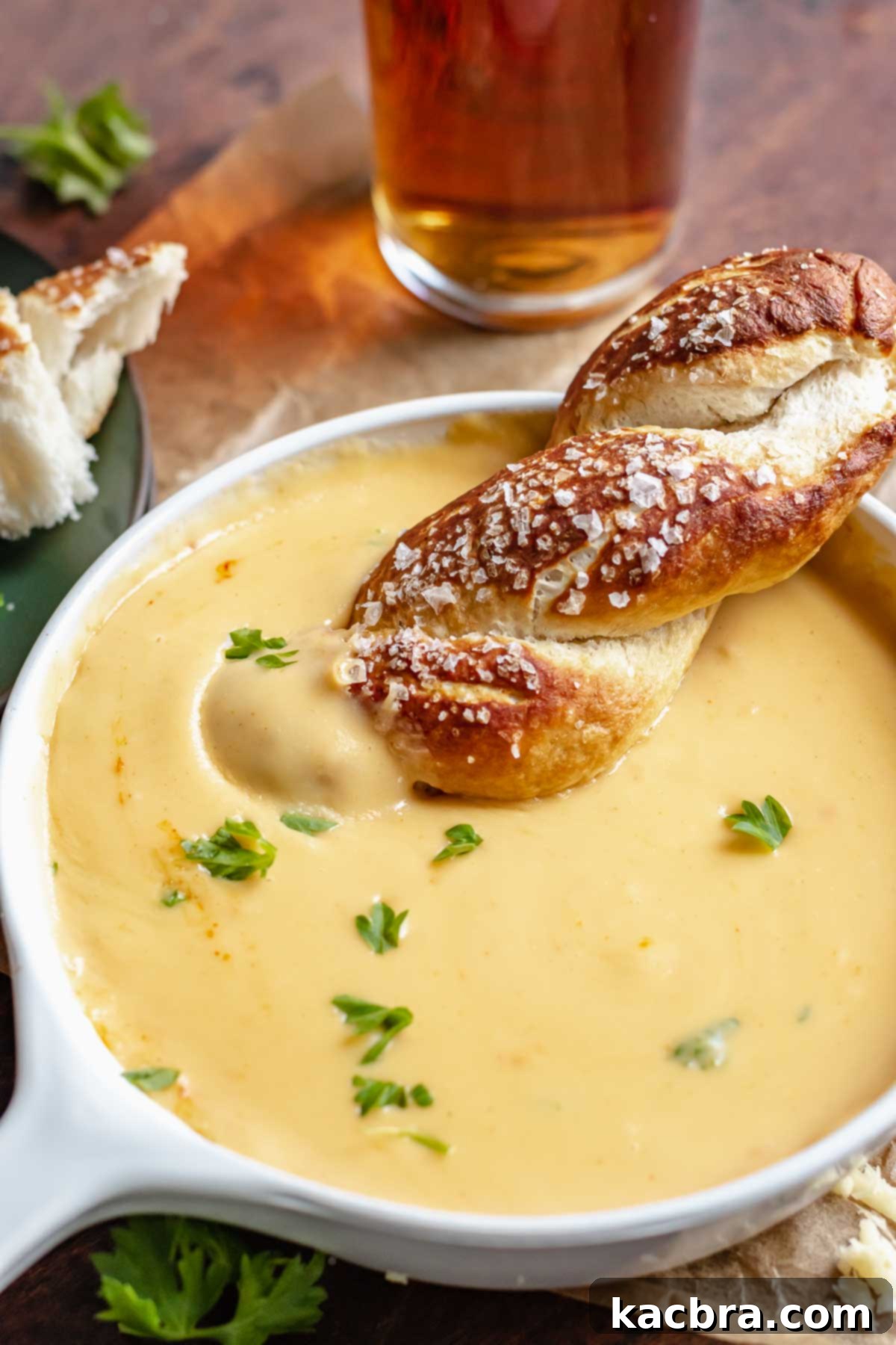A soft pretzel twist in beer cheese dip.
