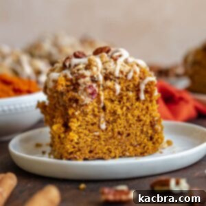 Slice of pumpkin coffee cake on a plate.