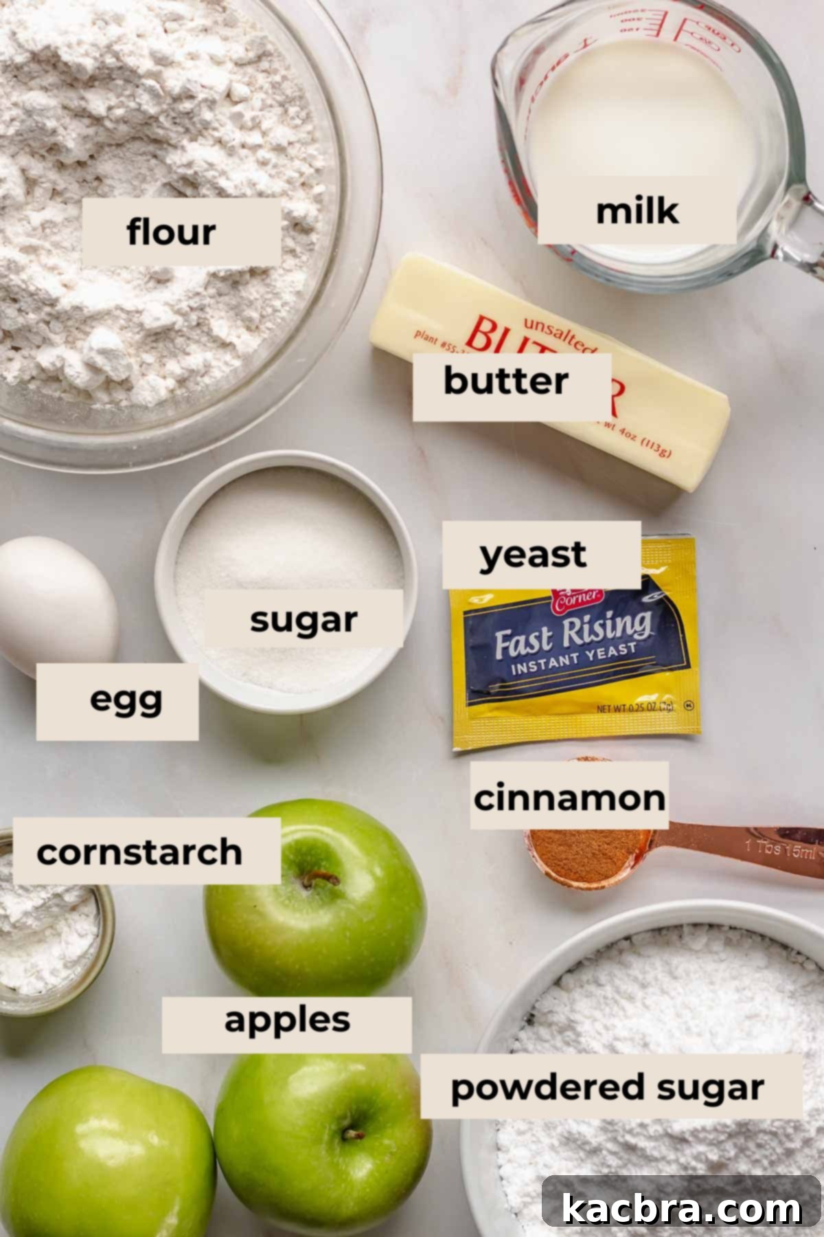 A meticulously arranged flat lay of all the fresh ingredients needed for baking delicious apple fritter donuts, showcasing their vibrant colors and textures.