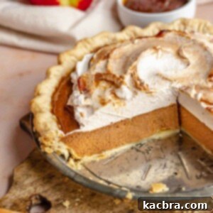 A delicious apple butter pie with slices removed, showcasing its creamy texture and inviting appeal.