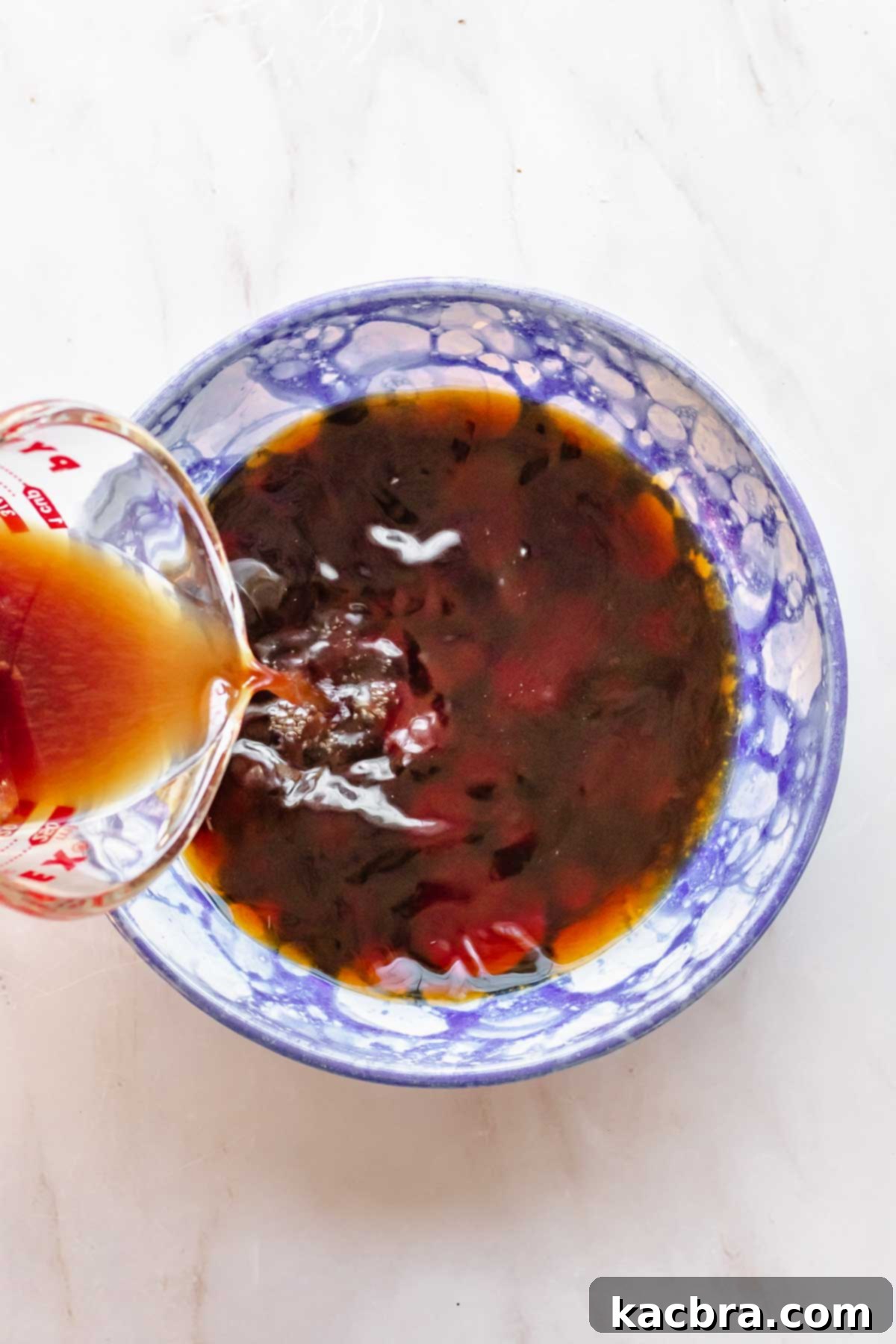 Coffee being poured into a bowl.