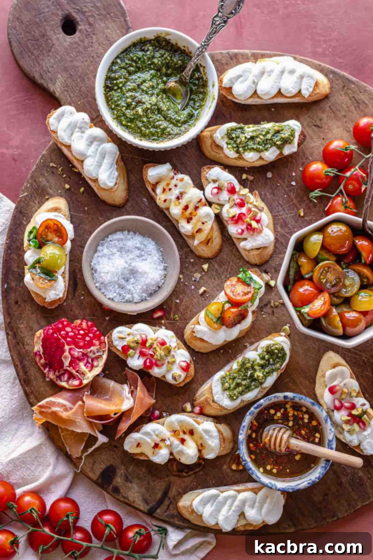Fluffy Ricotta Crostini 2 An arrangement of whipped ricotta crostini on a board with fixings.
