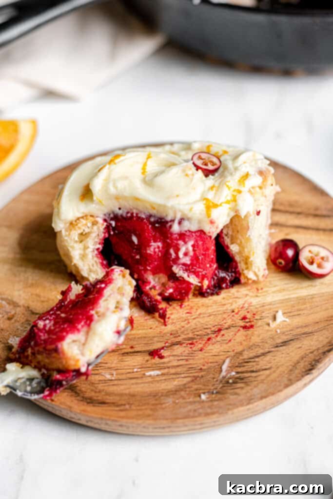 A close-up shot of the soft dough being kneaded in a stand mixer, demonstrating its supple texture.