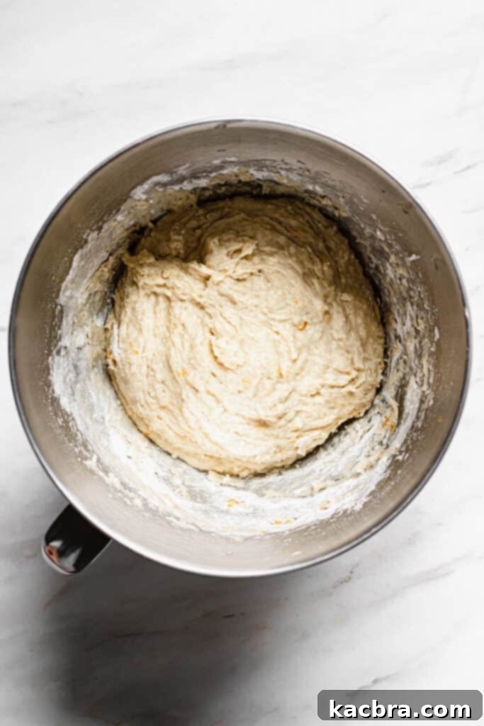 Image showing wet ingredients mixed into the yeast mixture.