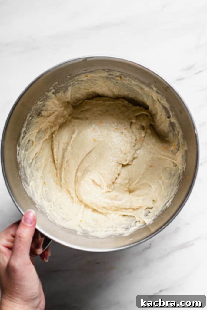 Image showing flour added to the mixer bowl.