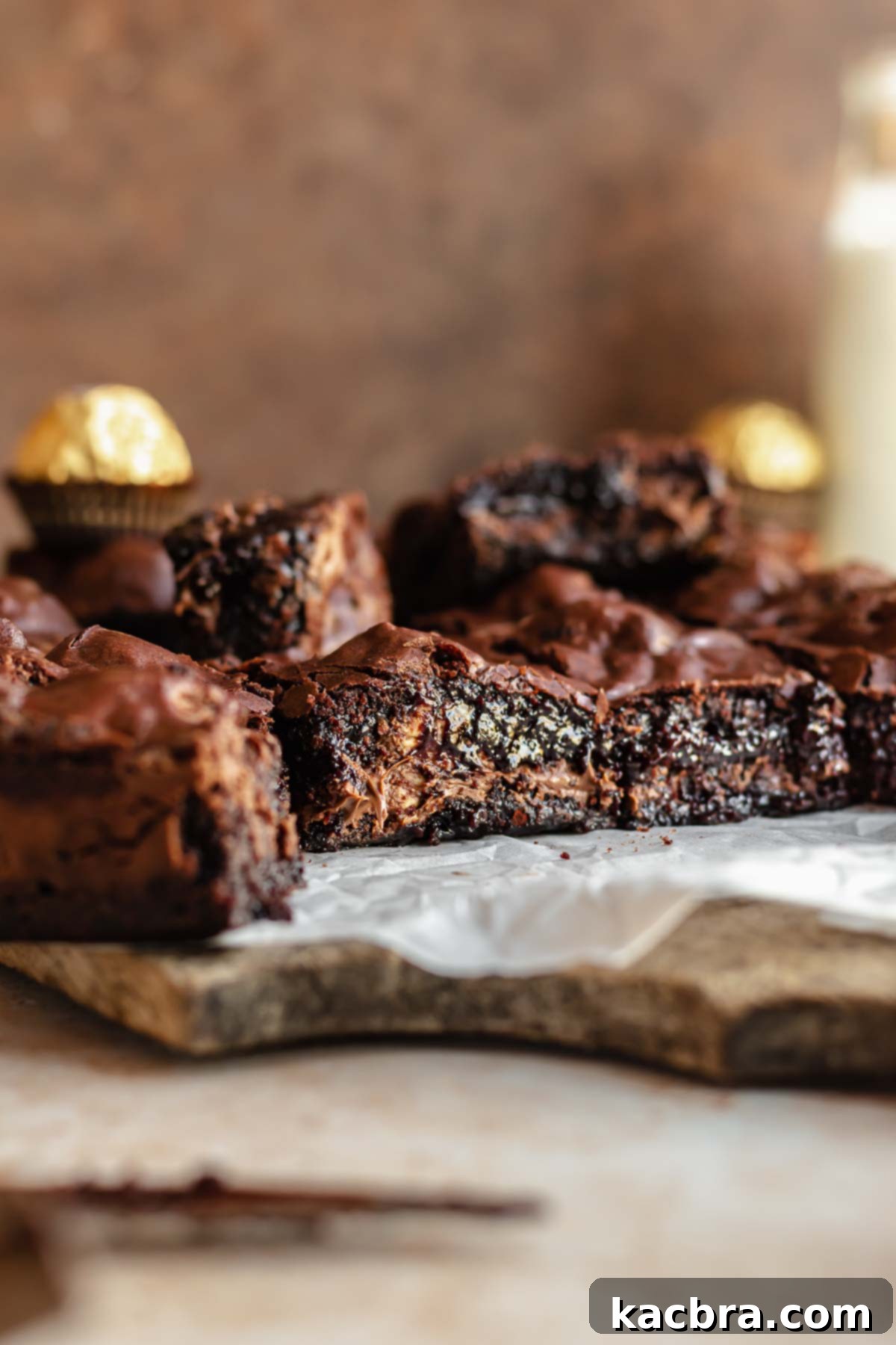 Cut brownies on a cutting board.