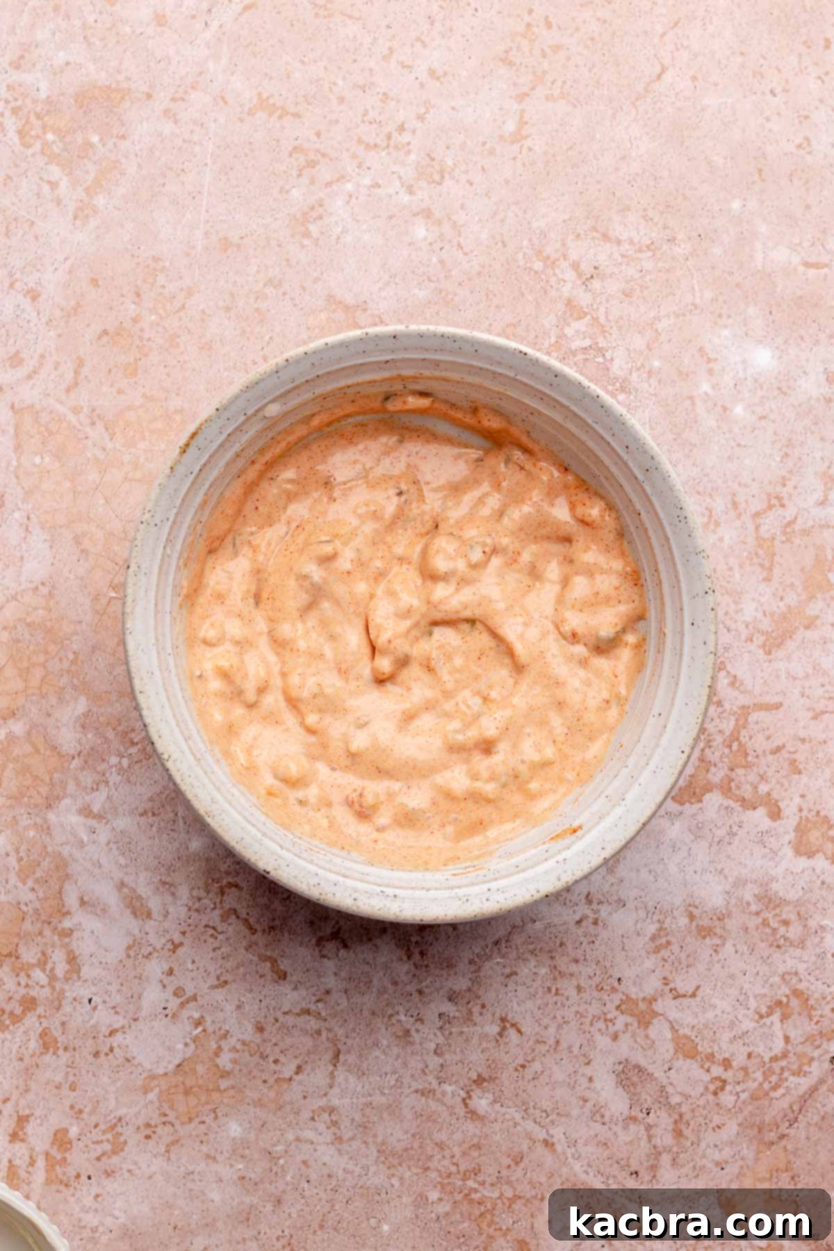 Reuben Spring Rolls 5 Thousand island dip mixed together in a bowl